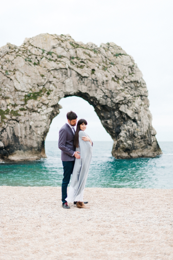 Engagement photo on beach dorset coast england