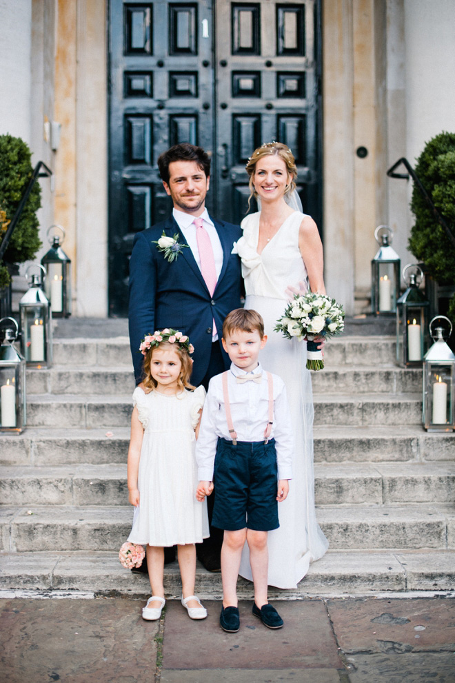 photo of flower girl and page boy with bride and groom at one marylebone