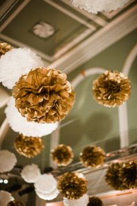 gold and white pom poms at london wedding in marylebone