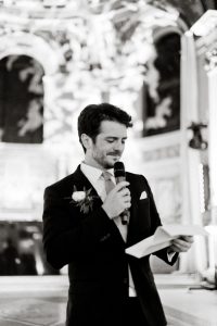 black and white wedding photography of groom's speech at london wedding